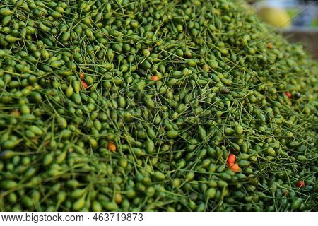 Heap Of Fresh Delicious Chiltepin At Market, Closeup