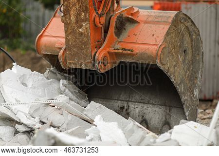 Details With An Excavator Bucket (scoop) Used To Demolish An Aac Small Building.