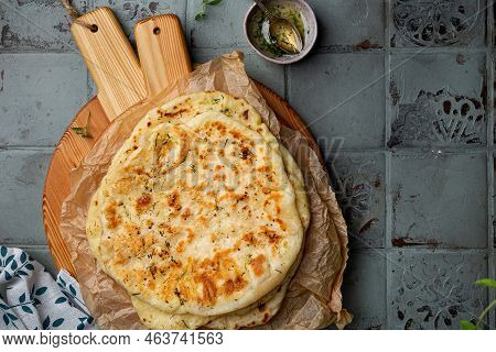 Fresh Indian Bread Naan With Cheese And Garlic