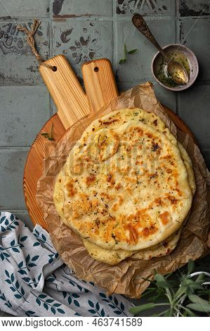 Fresh Indian Bread Naan With Cheese And Garlic