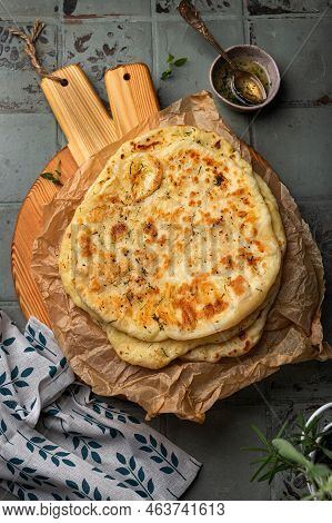 Fresh Indian Bread Naan With Cheese And Garlic