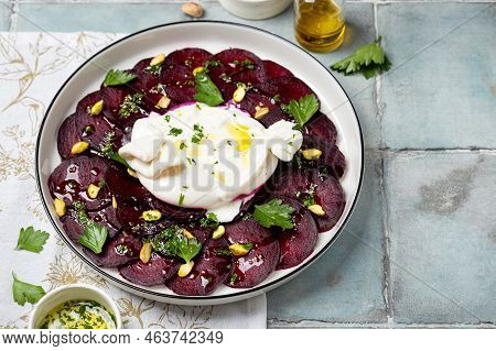 Beetroot Carpaccio With Mozzarella Burrata Cheesse And Pistachios