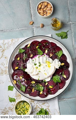 Beetroot Carpaccio With Mozzarella Burrata Cheesse And Pistachios