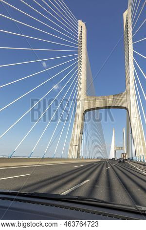 Lisbon, Portugal - June 8, 2020: Crossing The Vasco Da Gama Bridge Spanning River Tejo In Lisbon, Po