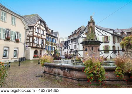 Eguisheim, France - October 4, 2021: Beautiful View Of The Historic Town Square Of Eguisheim, A Popu