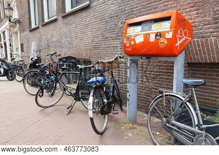 Amsterdam, Netherlands - July 10, 2017: Public Mailbox Of Dutch Mail Service Postnl In Amsterdam, Ne