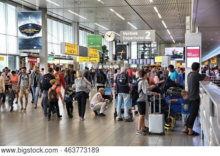 Amsterdam, Netherlands - July 11, 2017: Passenger Crowd At Schiphol Airport In Amsterdam. Schiphol I
