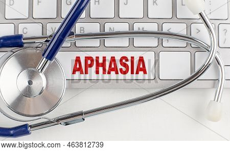 Aphasia Text On A Keyboard With Stethoscope , Medical Concept