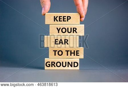 Keep Your Ear To The Ground Symbol. Concept Words Keep Your Ear On The Ground On Wooden Blocks. Busi