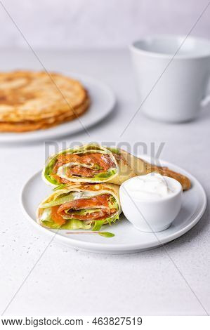 Pancakes With Salmon (trout), Sour Cream And Greenstuff. Thin, Not Sweet Blinchiki Stuffed With Red 