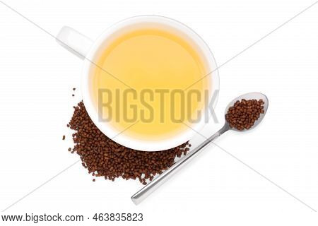 Cup Of Aromatic Buckwheat Tea And Granules On White Background, Top View