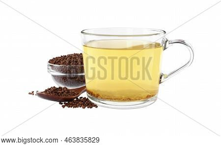 Cup Of Aromatic Buckwheat Tea And Granules On White Background