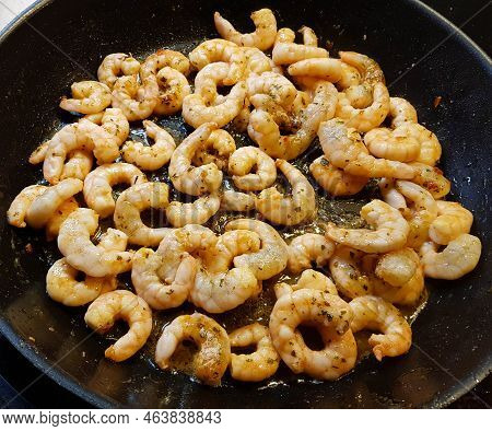 Some Fried Shrimps With Herbs And Spices