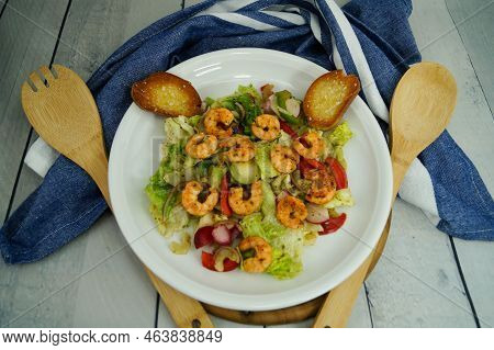 Some Fried Shrimps With Herbs And Spices