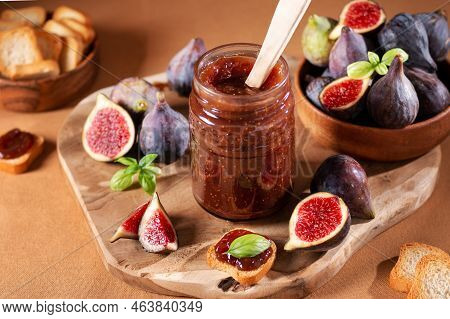 Autumn Preserves From Local Produce, Fig Jam Or Fig Marmalade On Wooden Board With Fresh, Ripe Figs,