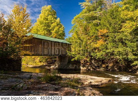 Side View Of Montgomery Covered Bridge Near Waterville In Vermont During The Fall