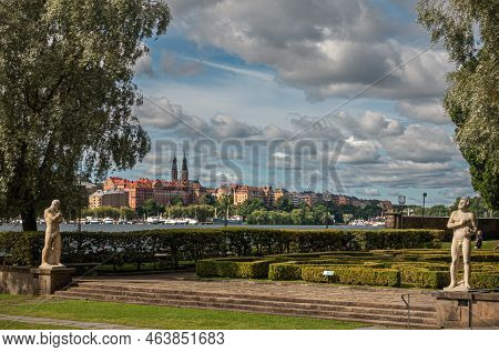 Sweden, Stockholm - July 16, 2022: City Hall Or Stadshuset Garden, West Side With 2 Stone Male Statu