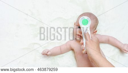 Thermometer Child Fever. Doctor Check Cold Flu Baby Temperature Care From Electronic Thermometer. Fe