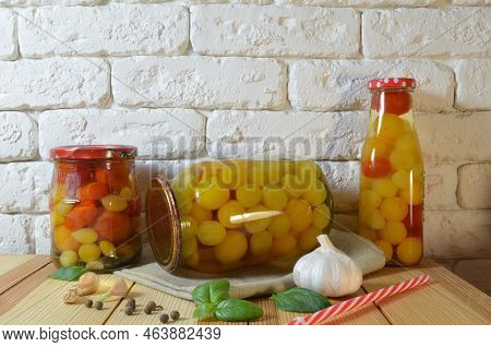 Tomatoes In A Jar. Red, Yellow Orange Fruits. Pickles. Proper Nutrition