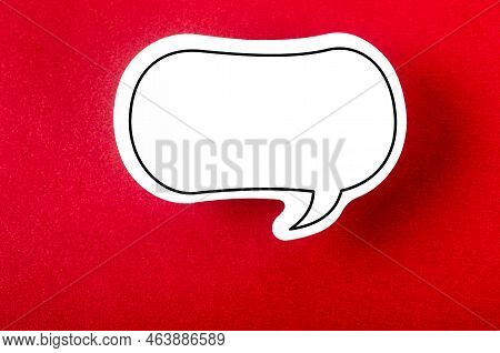 Speech Bubble With Copy Space Communication Talking Speaking Concepts On Red Background.