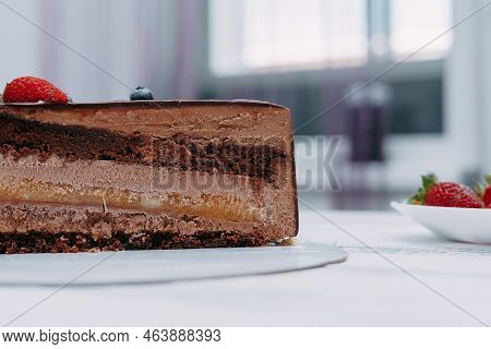 A Piece Of Chocolate Cake In The Cut. Preparation Of Mousse Cake At A Culinary Master Class. Cooking