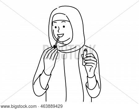 Smiling Young Arabic Woman In Hijab Applying Lip Gloss On Lips. Happy Arabian Girl Do Makeup. Beauty