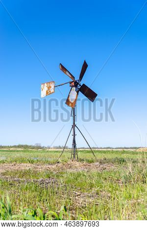 Typical Wind Mill In The Dutch National Reserve 