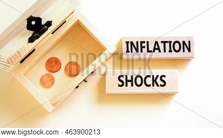 Inflation Shocks Symbol. Concept Words Inflation Shocks On Wooden Blocks. Beautiful White Table Whit