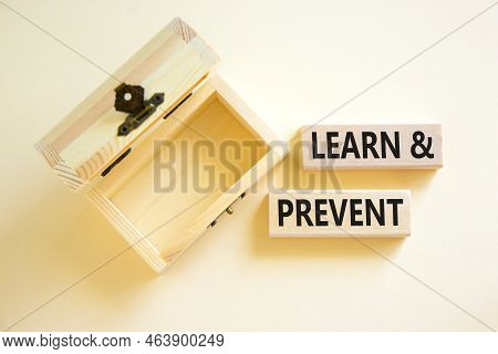 Learn And Prevent Symbol. Concept Words Learn And Prevent On Wooden Blocks On Beautiful White Table 