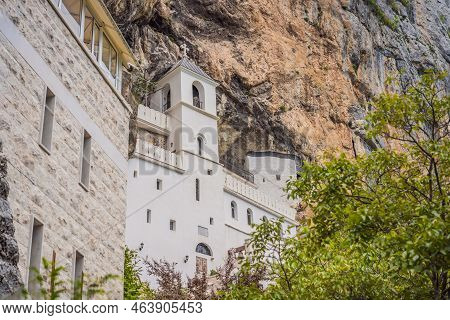 Monastery Of Ostrog, Serbian Orthodox Church Situated Against A Vertical Background, High Up In The 