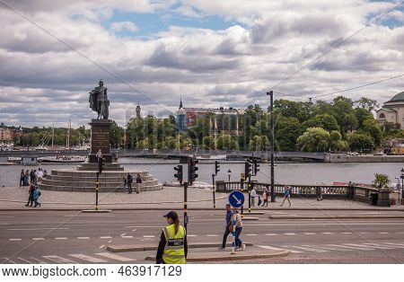 Sweden, Stockholm - July 16, 2022: Cityscape, Outside Royal Palace Where Skeppsbron Meets Slottsbake