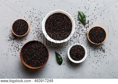Quinoa Seeds In Bowl On Colored Background. Healthy Kinwa In Small Bowl. Healthy Superfood.