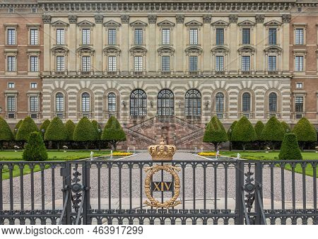 Sweden, Stockholm - July 16, 2022: Central Part Of Royal Palace Decorated East Facade Behind Logarde