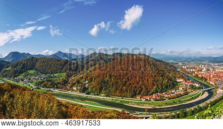 Aerial Panoramic Autumn View To The City Celje In Slovenia. Autumn Trees, Green Meadows And Red Roof