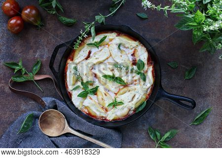 Conchiglie Stuffed Pasta Shells, With Ricotta Cheese, Mozzarella  And Basil Leaves In A Cast Iron Pa