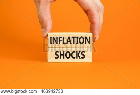 Inflation Shocks Symbol. Concept Words Inflation Shocks On Wooden Blocks. Beautiful Orange Table Ora