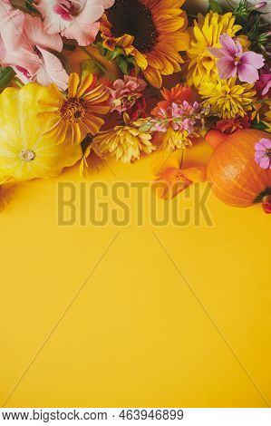 Happy Thanksgiving! Stylish Autumn Composition On Yellow Background. Colorful Autumn Flowers, Pumpki