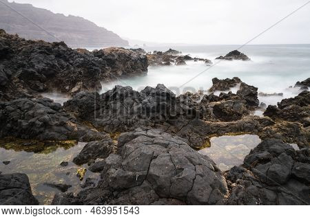 Classical View Of The Coast Of Lanzarote Formed Mostly By Cooled Lava During A Cloudy Day.