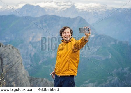 Man Tourist On Background Of Breathtaking Panoramic View Of The Grlo Sokolovo Gorge In Montenegro. I