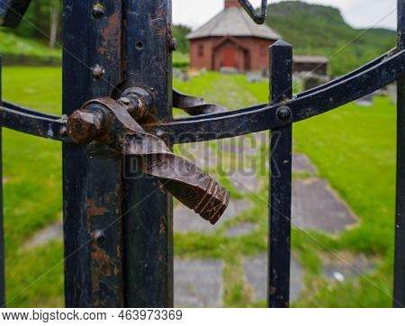 Old Iron Gate In Front Of The Bøverdal Church In Galdesanden, Norway. It Was Built In An Octagonal D
