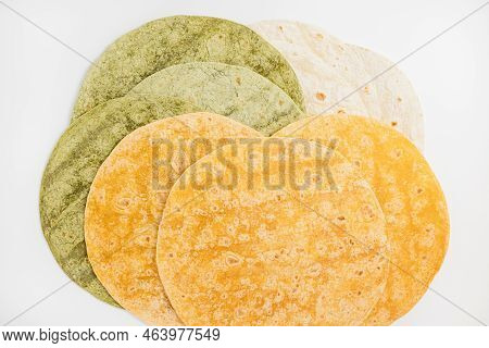 Tomato, Spinach Flavored And Plain Wheat Tortilla Wraps. Spanish Or Mexican Circular Unleavened Flat