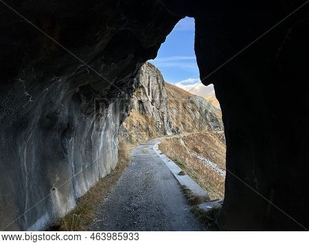 A Small Tunnel On The Footpath Above The Reservoir Lake Lago Di Lucendro Or In The Swiss Alpine Area