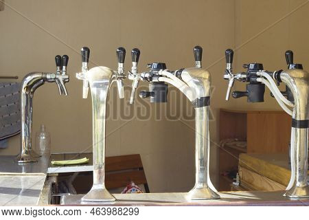 Bar Counter, Empty Taps In The Absence Of A Bartender