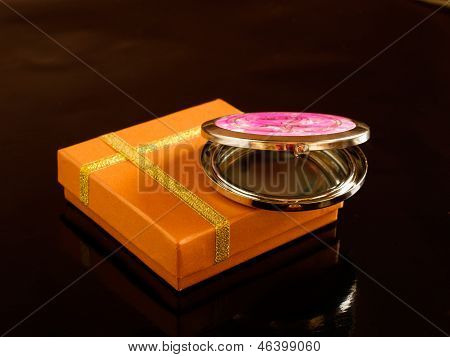 Pocket Mirror And Yellow Box