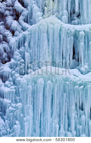 a frozen from the cold waterfall. icy waterfall in winter.