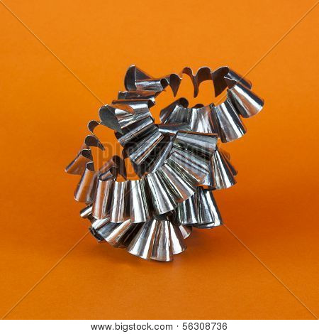 Metal Swarf On Orange Background