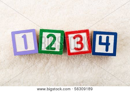 1234 toy block with towel background