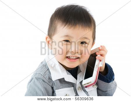 Asian little boy talk to phone