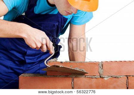 Worker Building A Wall