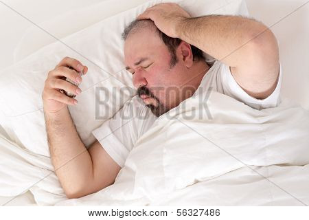 Man Suffering From A Hangover